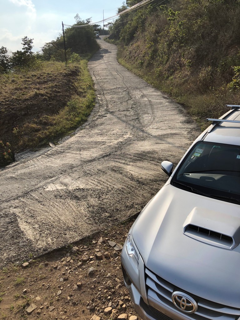 Silver Toyota Fortuna on steep road near Monteverde 