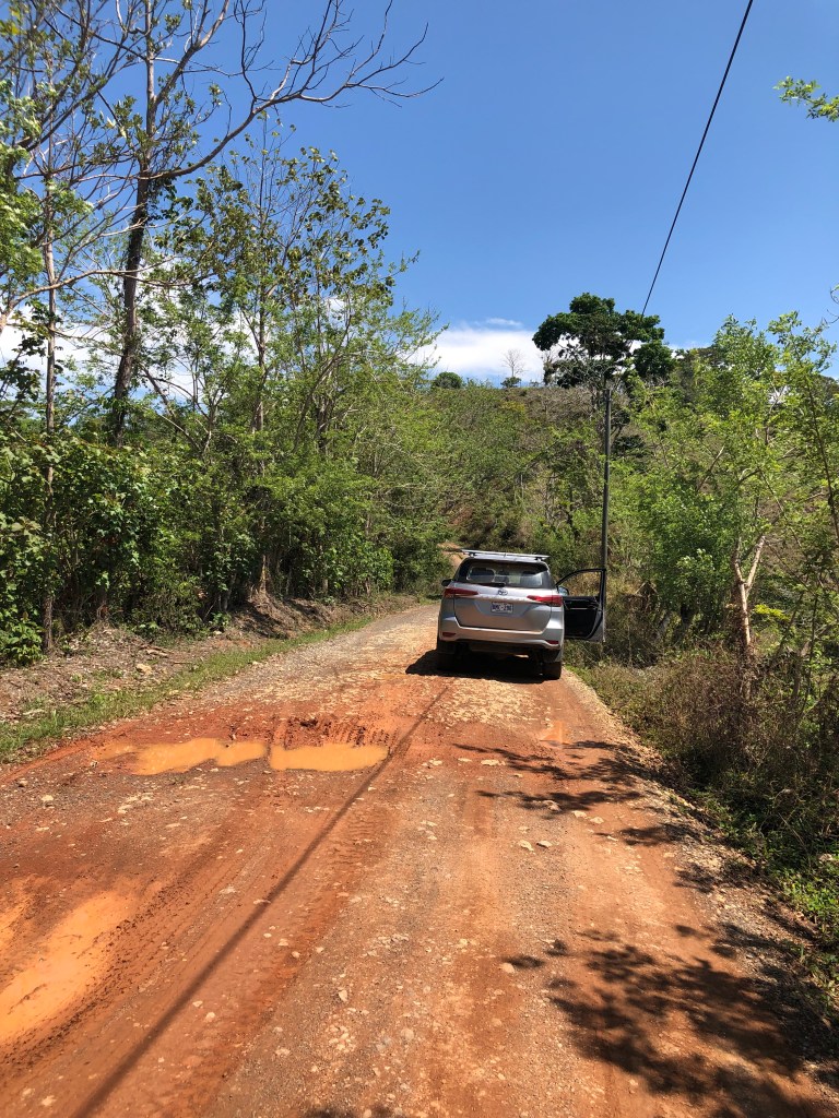 Toyota Fortuna on muddy road in Manuel Antonio, Costa Rica